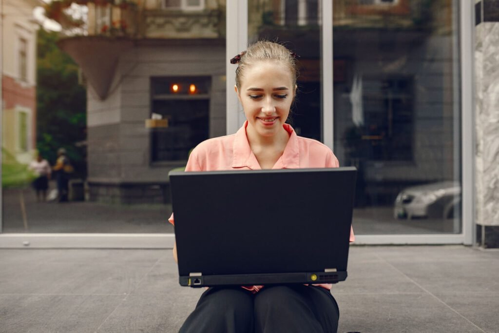 Professional-typing-on-a-computer-comparing-global-job-boards